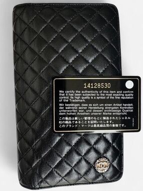 CHANEL Vintage Black Quilted Leather Wallet with Silver CC Charm